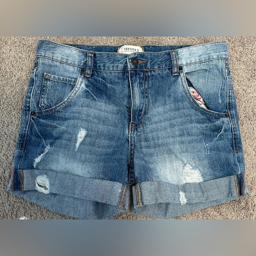 FOREVER 21 size 29 Blue Jean Shorts with Distressed Look.